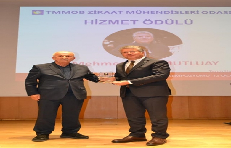 TMMOB’ DEN  İRFAN MUTLUAY’A HİZMET ÖDÜLÜ